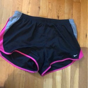 Black nike shorts with pink accents